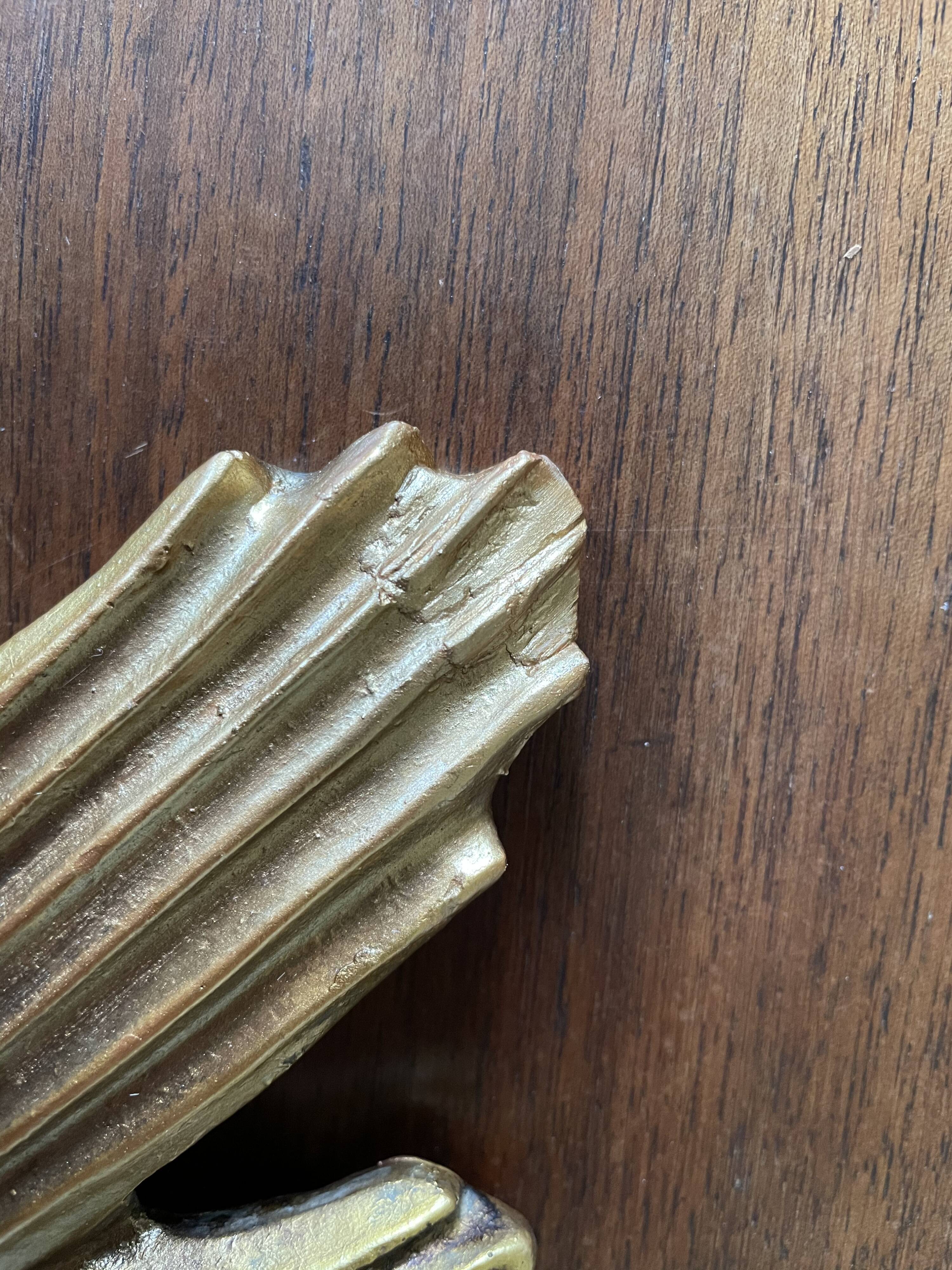 Vintage sun mirror in 60s/70s gold resin
