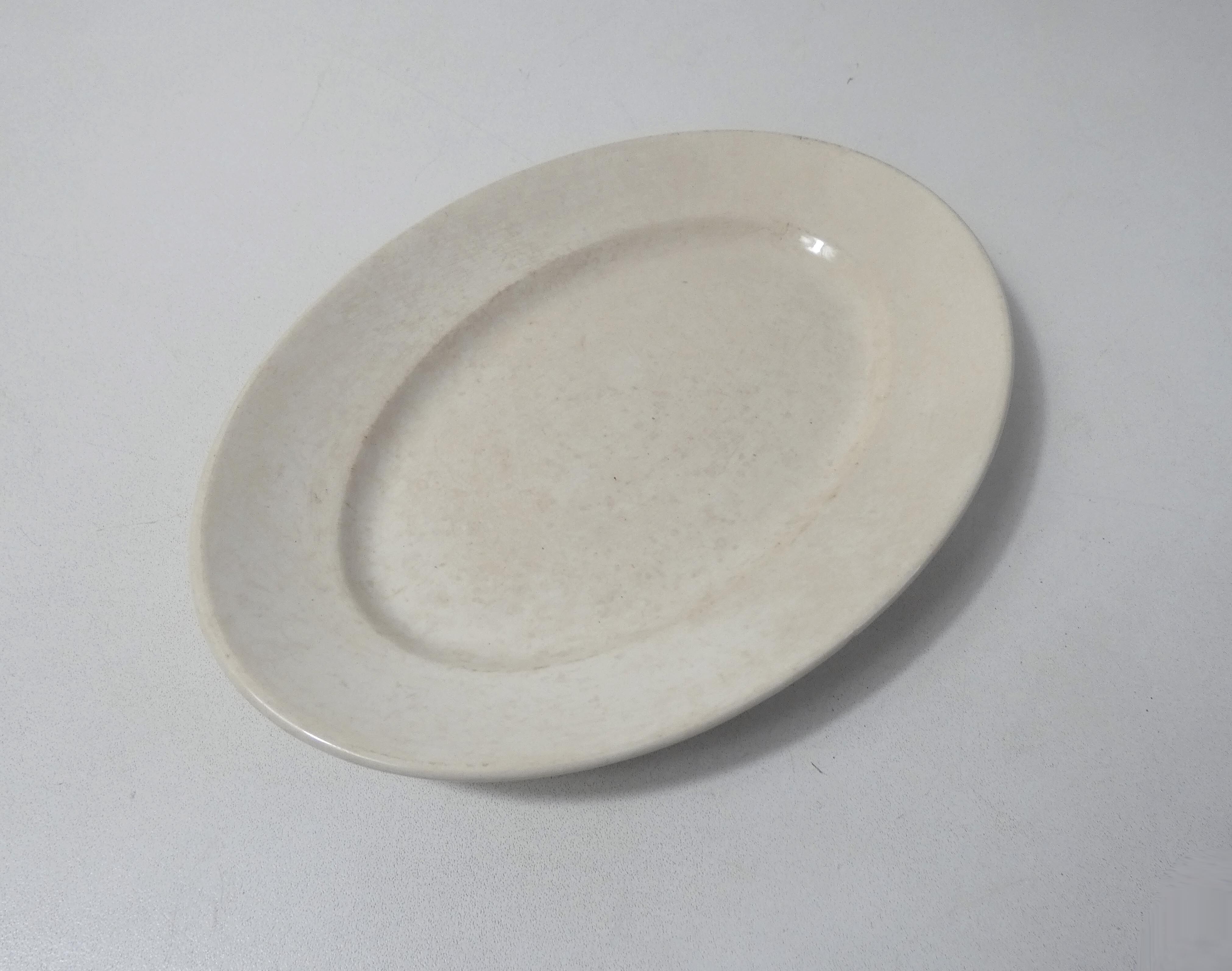 Ravier blanc en faience style creil et montereau