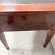 Louis XVI style flat desk in walnut and veneer, 19th century.