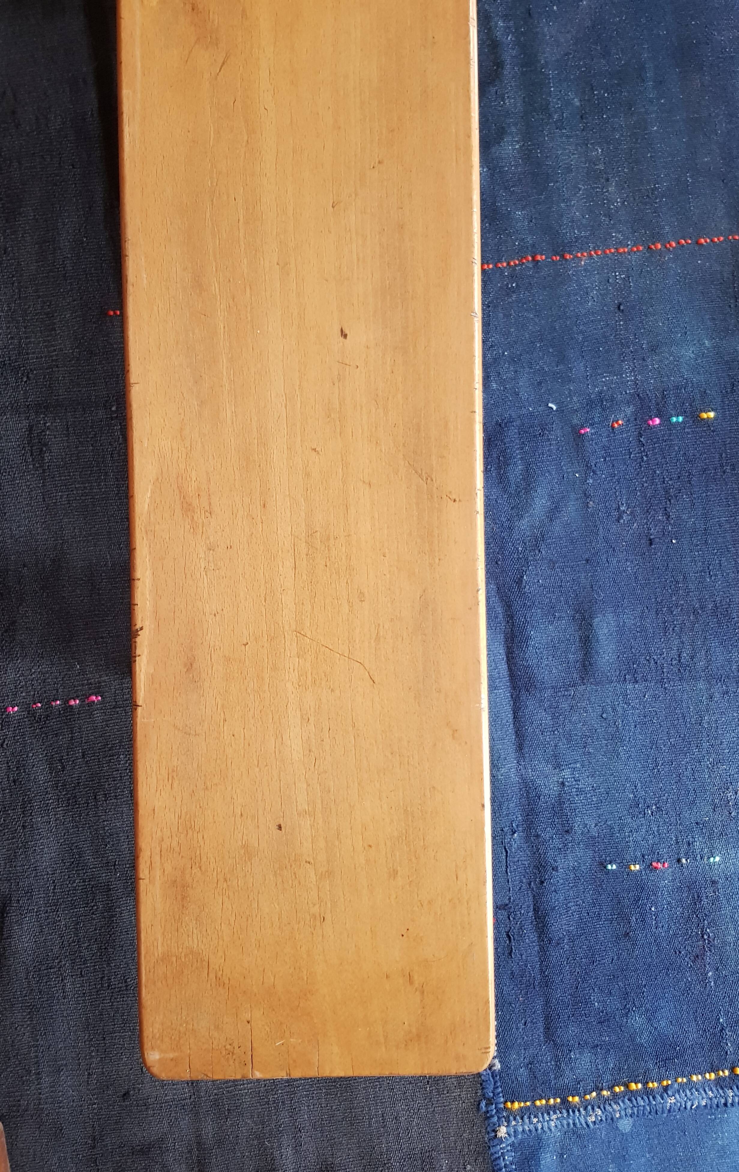 Varnished wooden bench