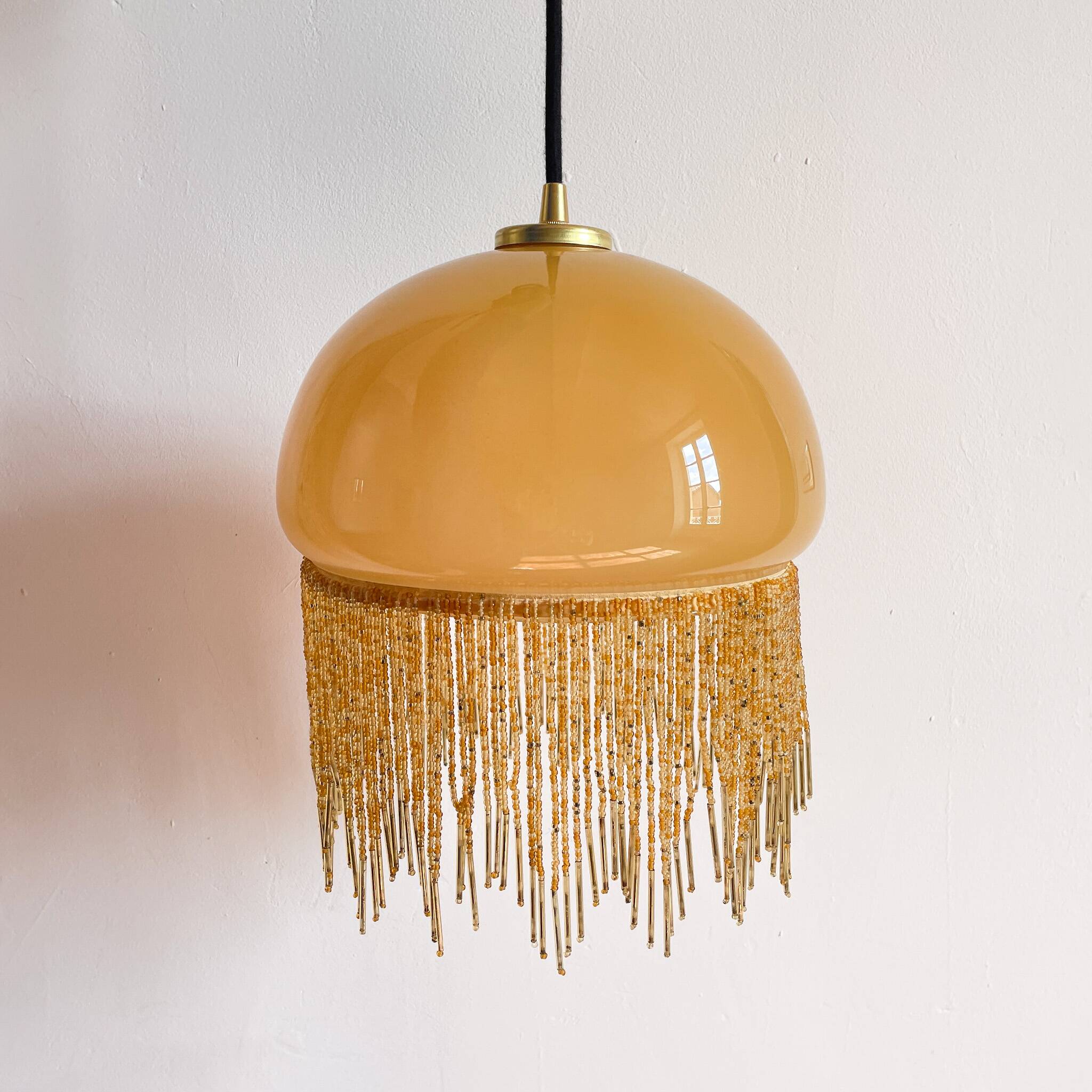 Fringed opaline pendant light