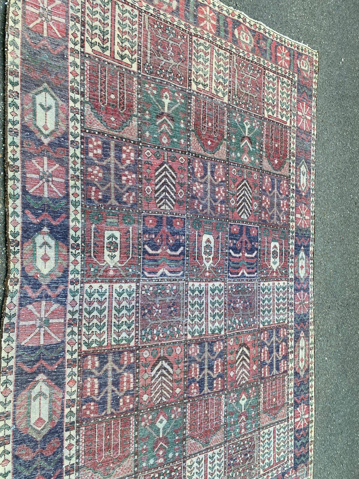 Handmade beige Bakhtiar rug with flowers 200x300.