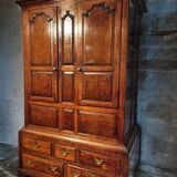 Antique English oak wardrobe with drawers, England, circa 1800–1820.