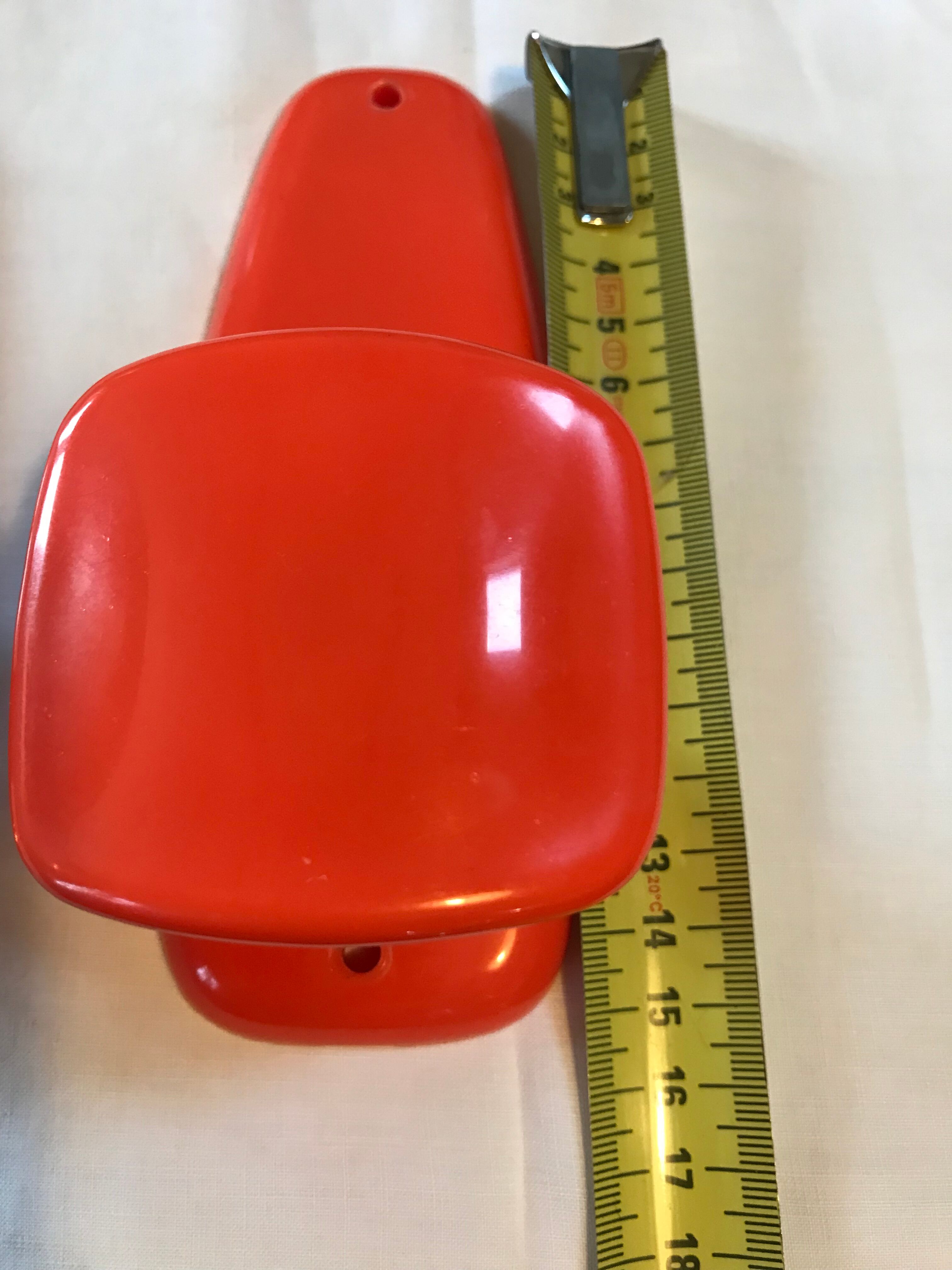 2 orange plastic hooks 70s.