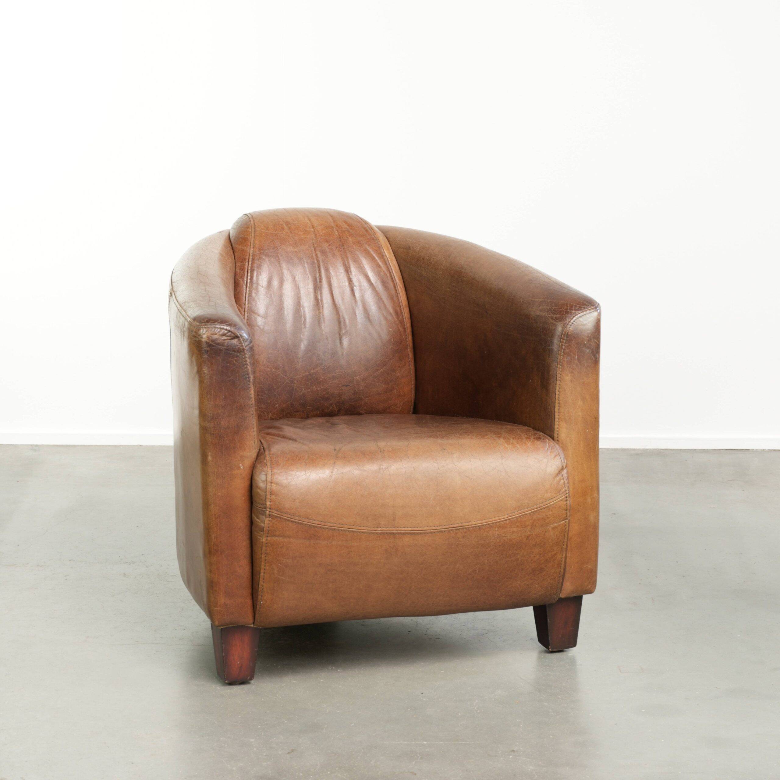 Fauteuil design aviateur en cuir de vache couleur cognac intemporelle