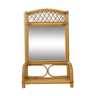 Mirror and its rattan shelf, 1970