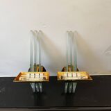 Pair of Hollywood Regency wall lights, bases & reflectors in gilded brass