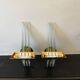 Pair of Hollywood Regency wall lights, bases & reflectors in gilded brass