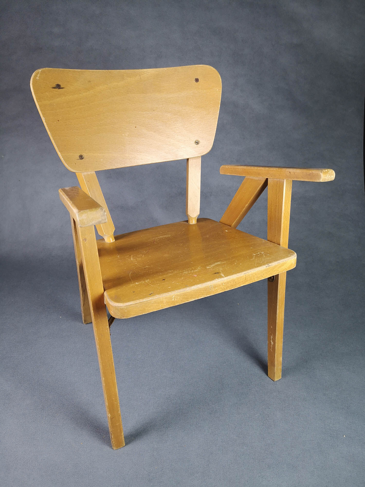 Vintage armchair child feet compass light wood