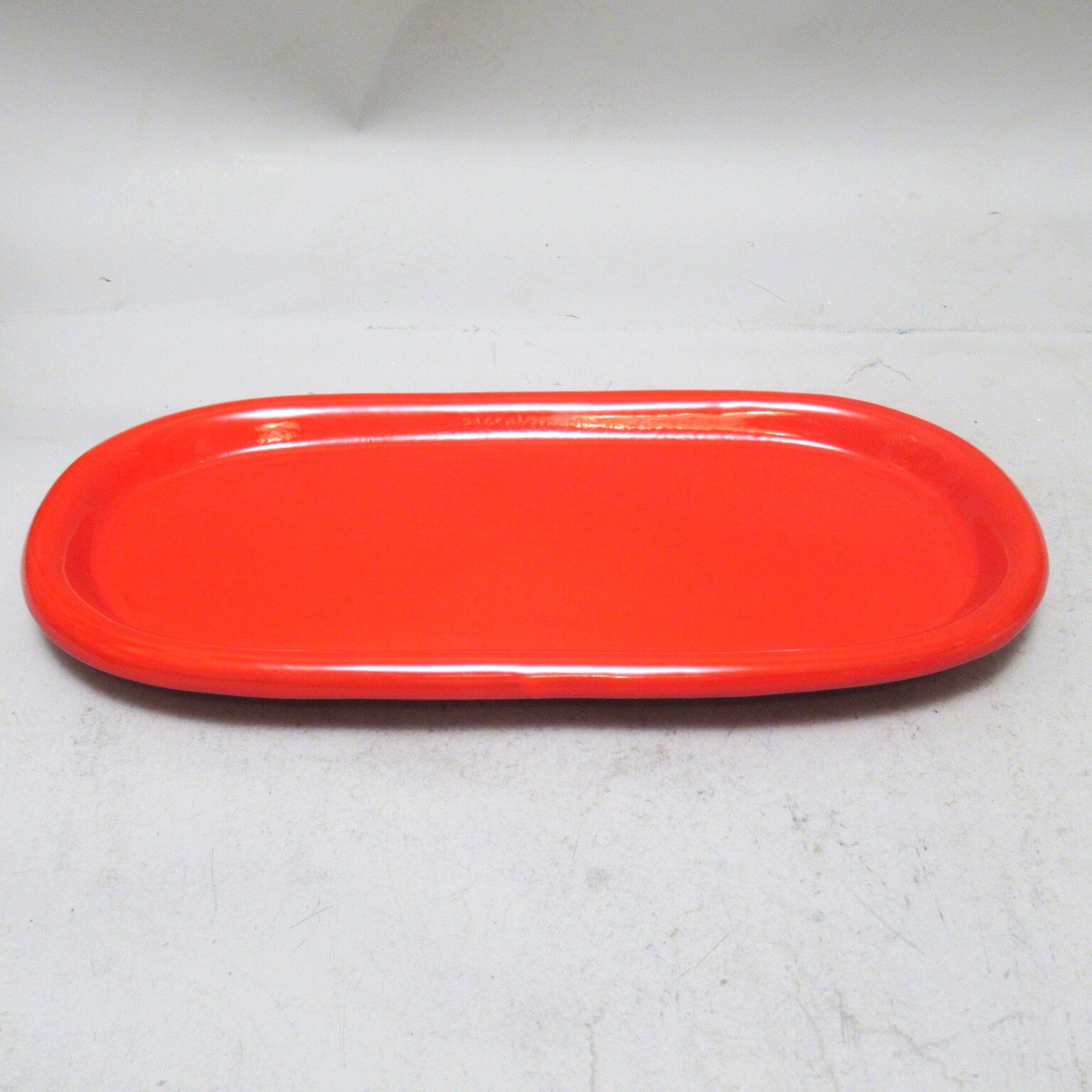 Oval red ceramic dish Italy 60s