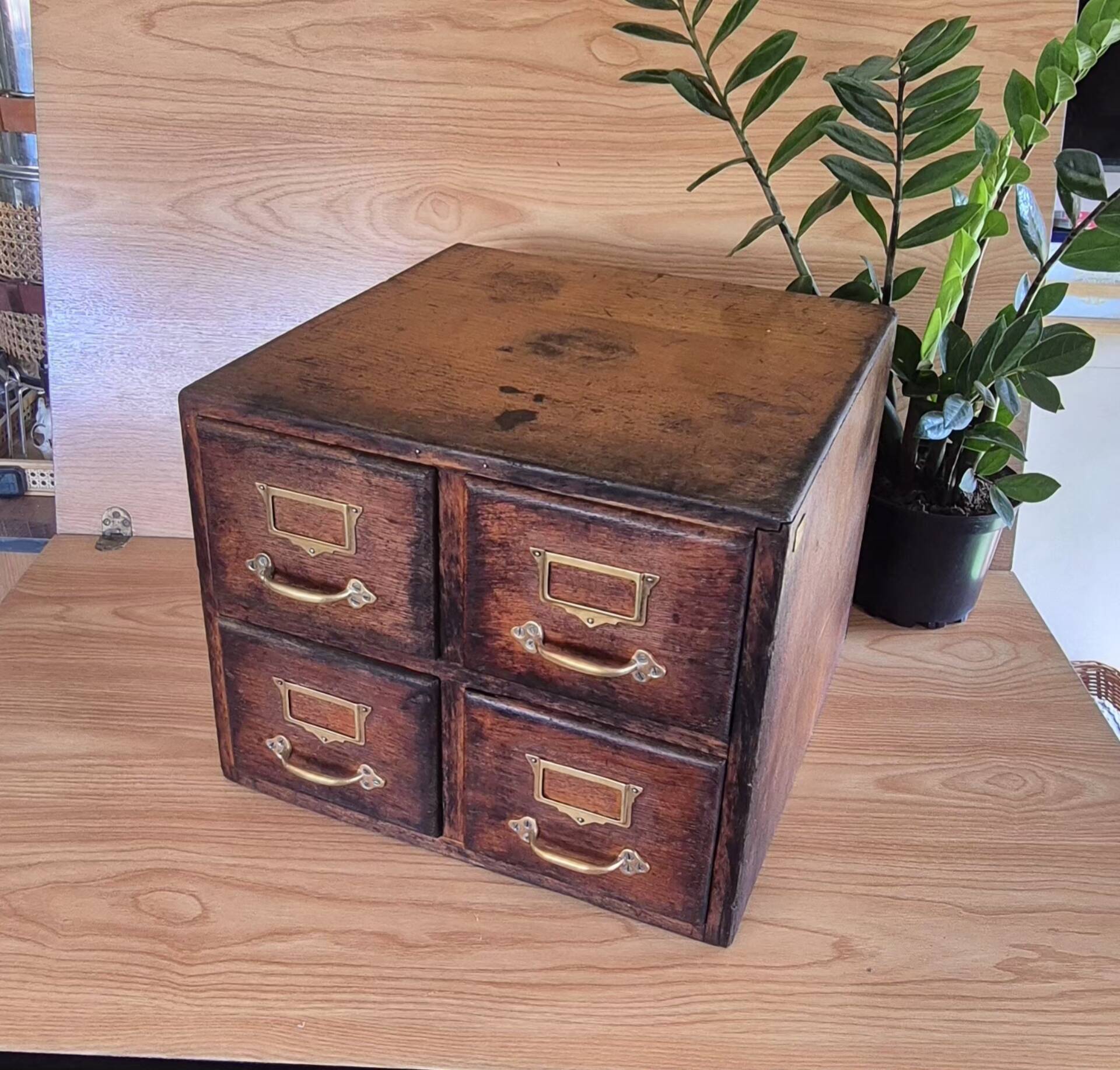 Workshop furniture made of oak and brass.