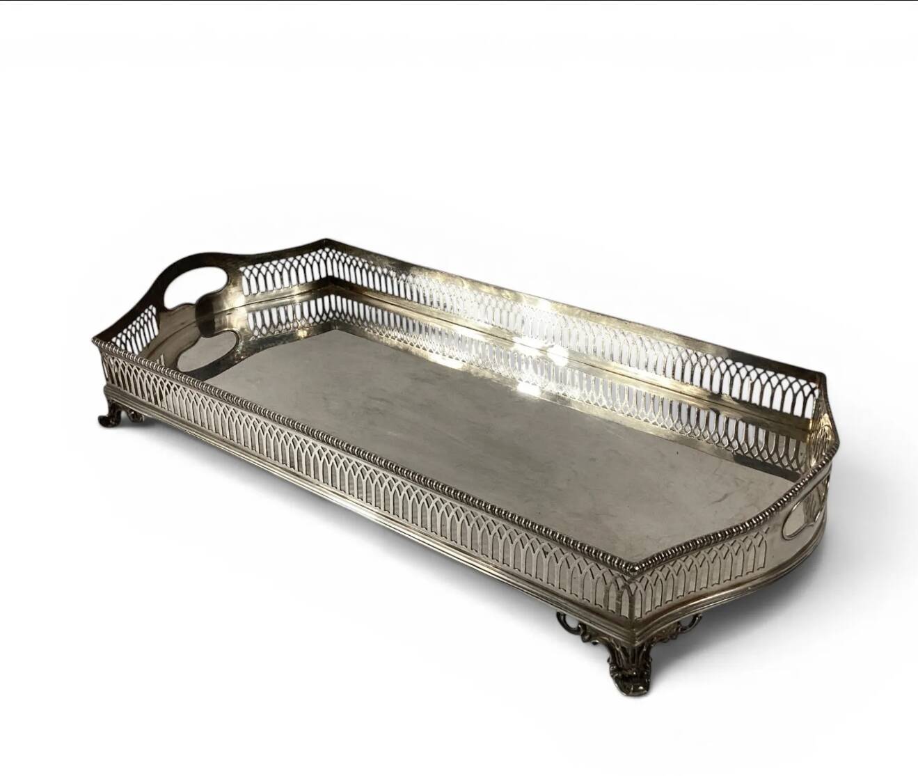 Important silver-plated metal table in the Louis XVI style.