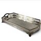 Important silver-plated metal table in the Louis XVI style.