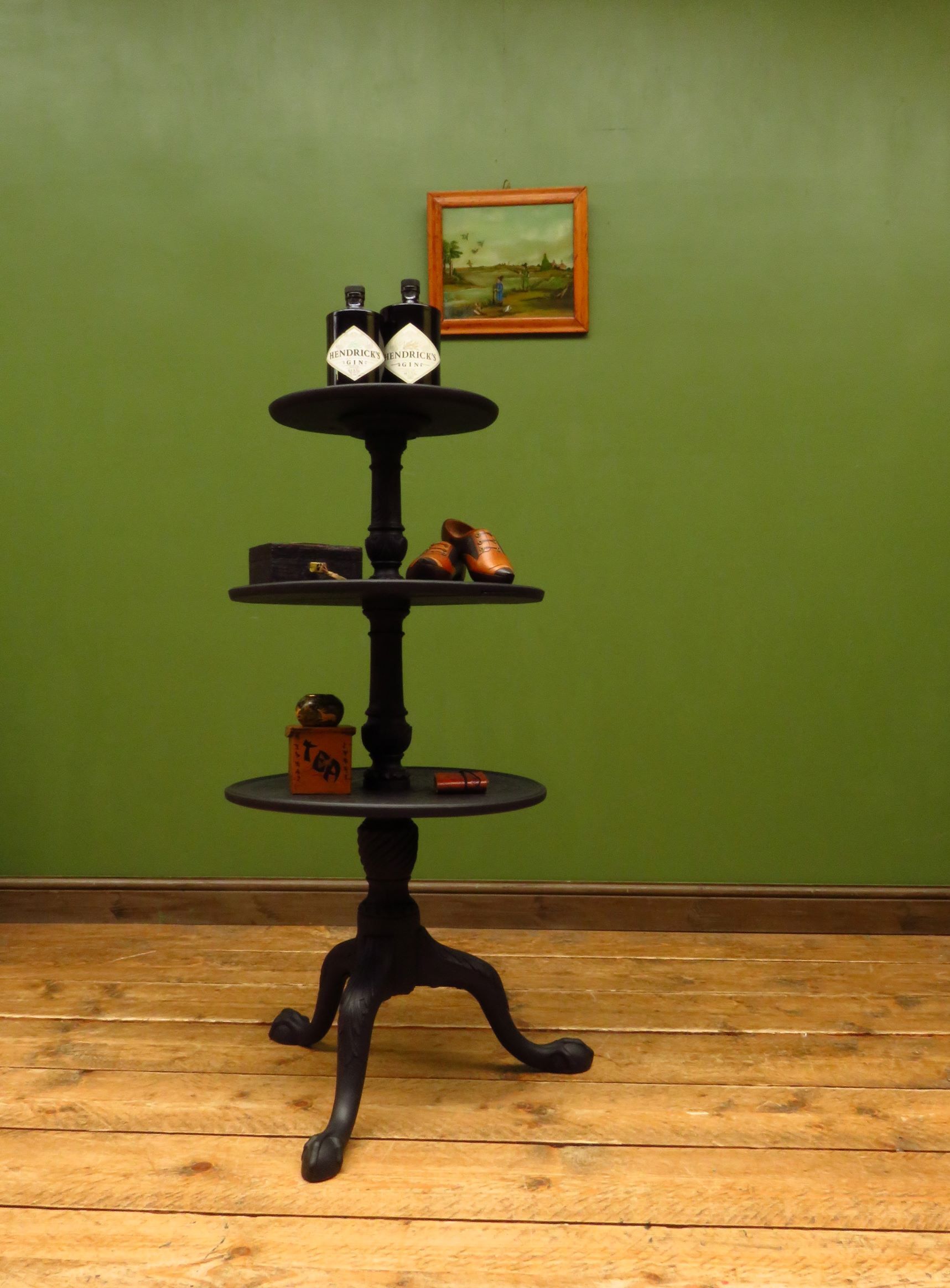 Antique black painted tiered stand
