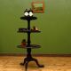 Antique black painted tiered stand