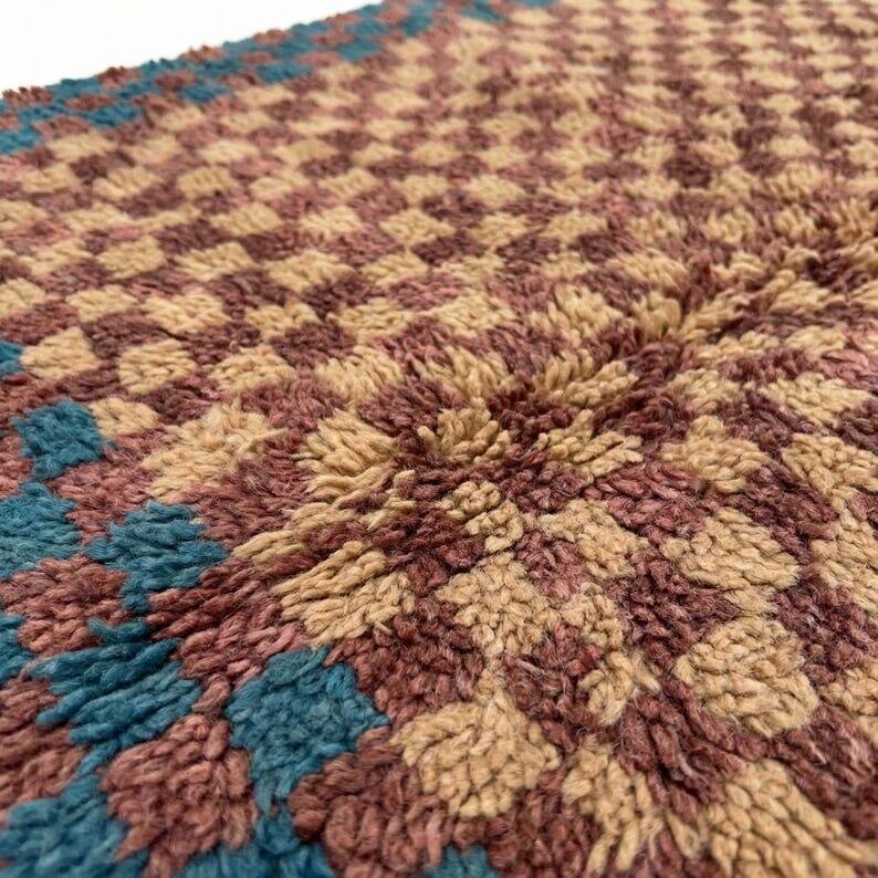 Handmade natural wool rug with colourful patterns, size 150/250 cm.