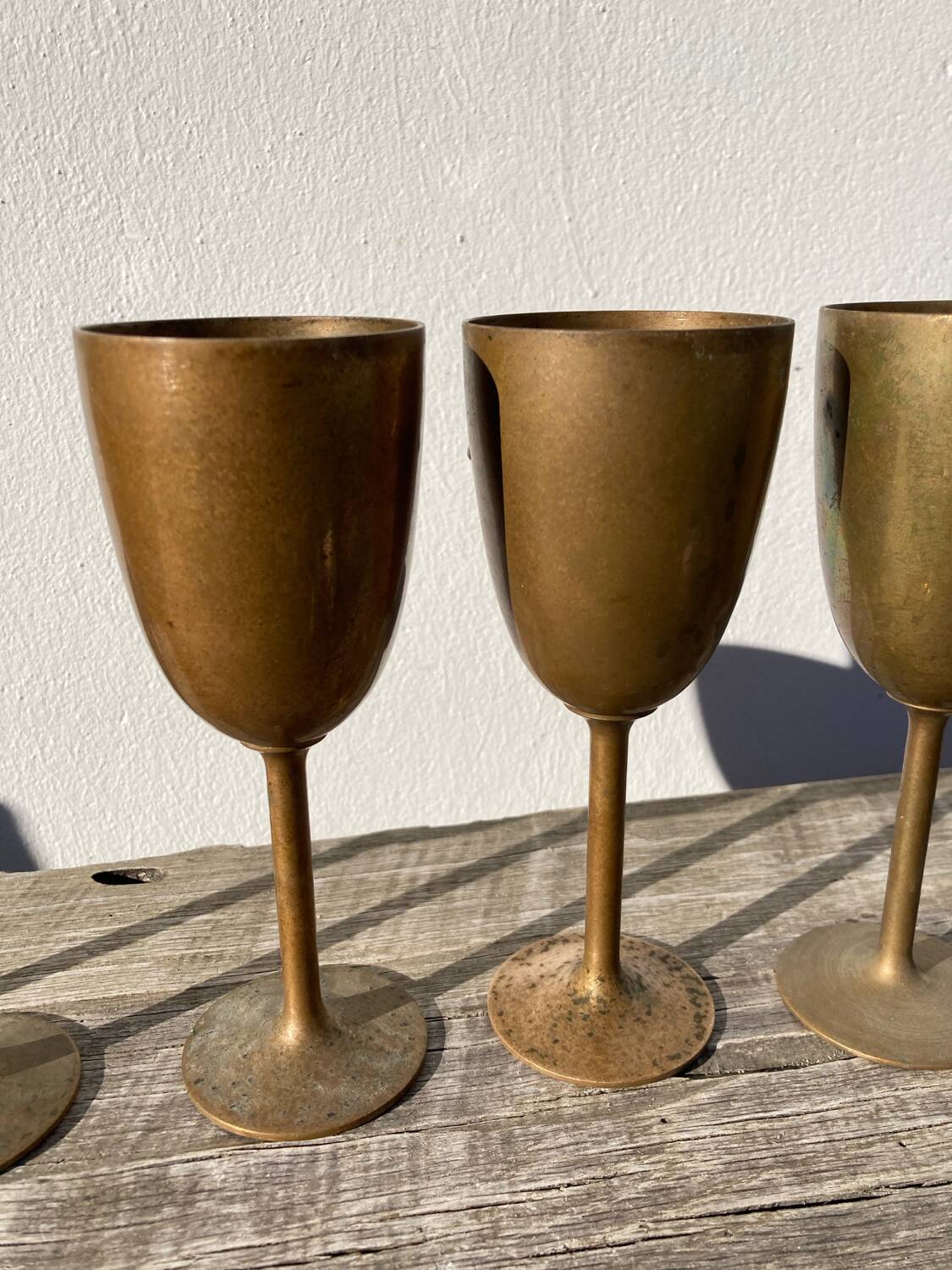 Copper brass stemmed glasses