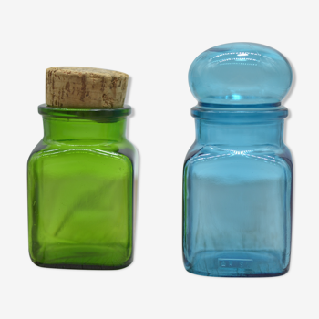 Set of 2 apothecary jars: one green and one blue ariel