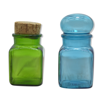 Set of 2 apothecary jars: one green and one blue ariel