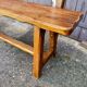 Brutalist bench with dark wood back