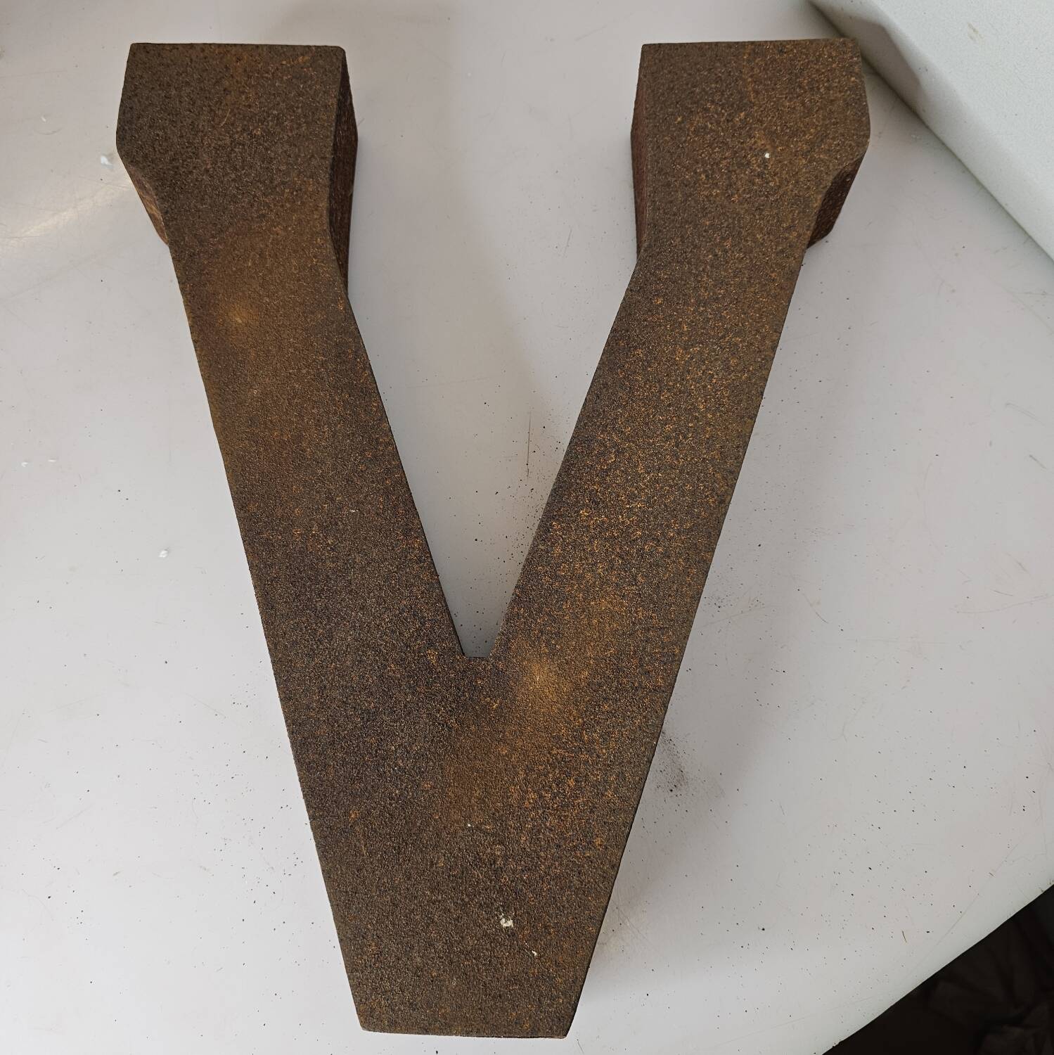 Industrial iron letter "V"