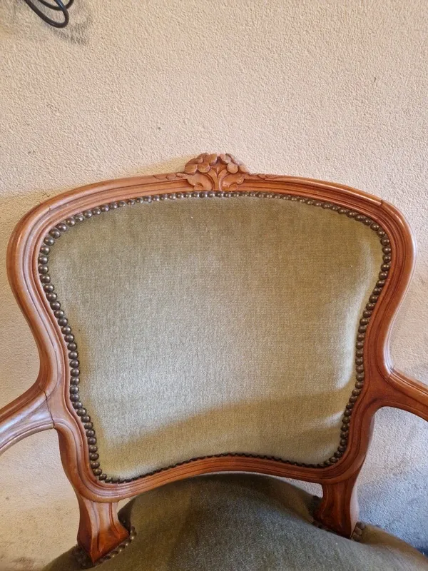 Pair of Louis XV style armchairs in cherry wood, upholstered in green velvet.