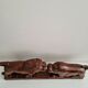 Lion and hippopotamus wood sculpture