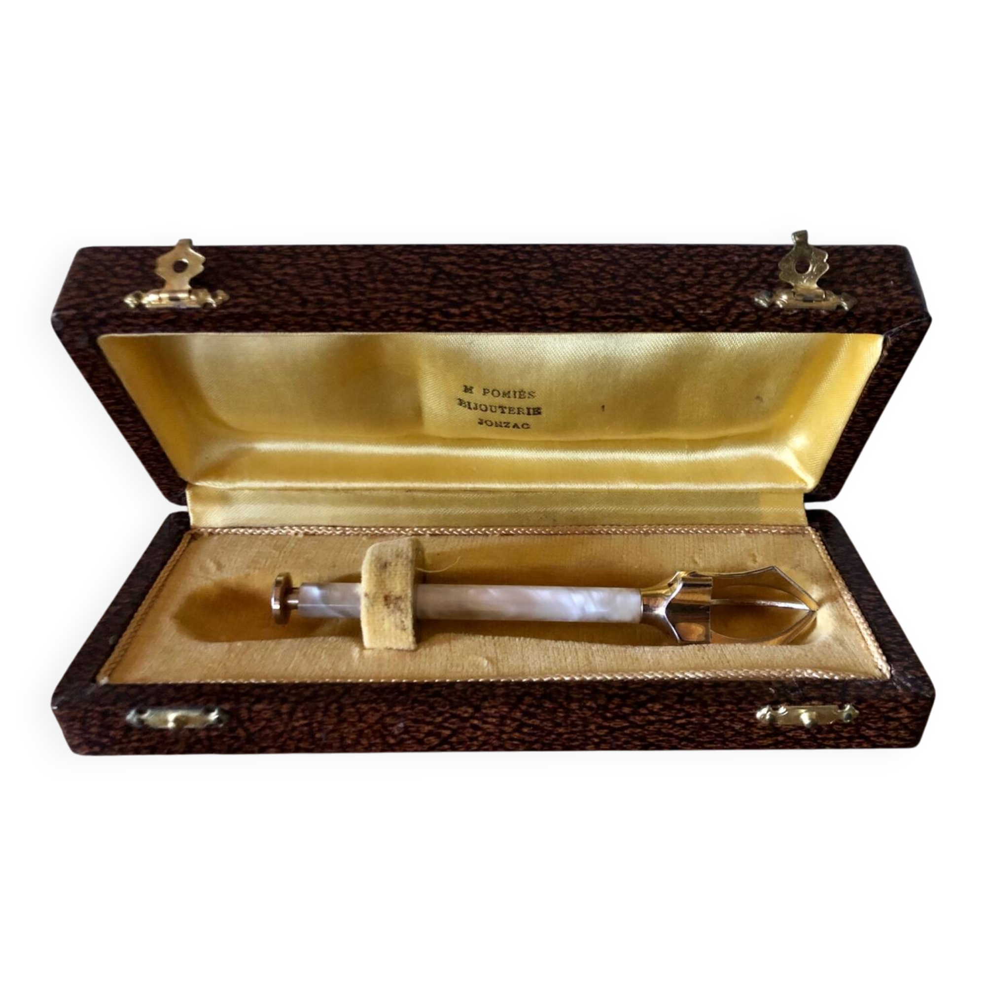 Sugar or ice tongs in their case