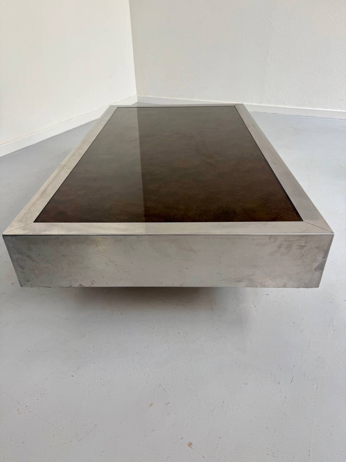 Italian coffee table in chromed metal and vintage brown glass top 70s