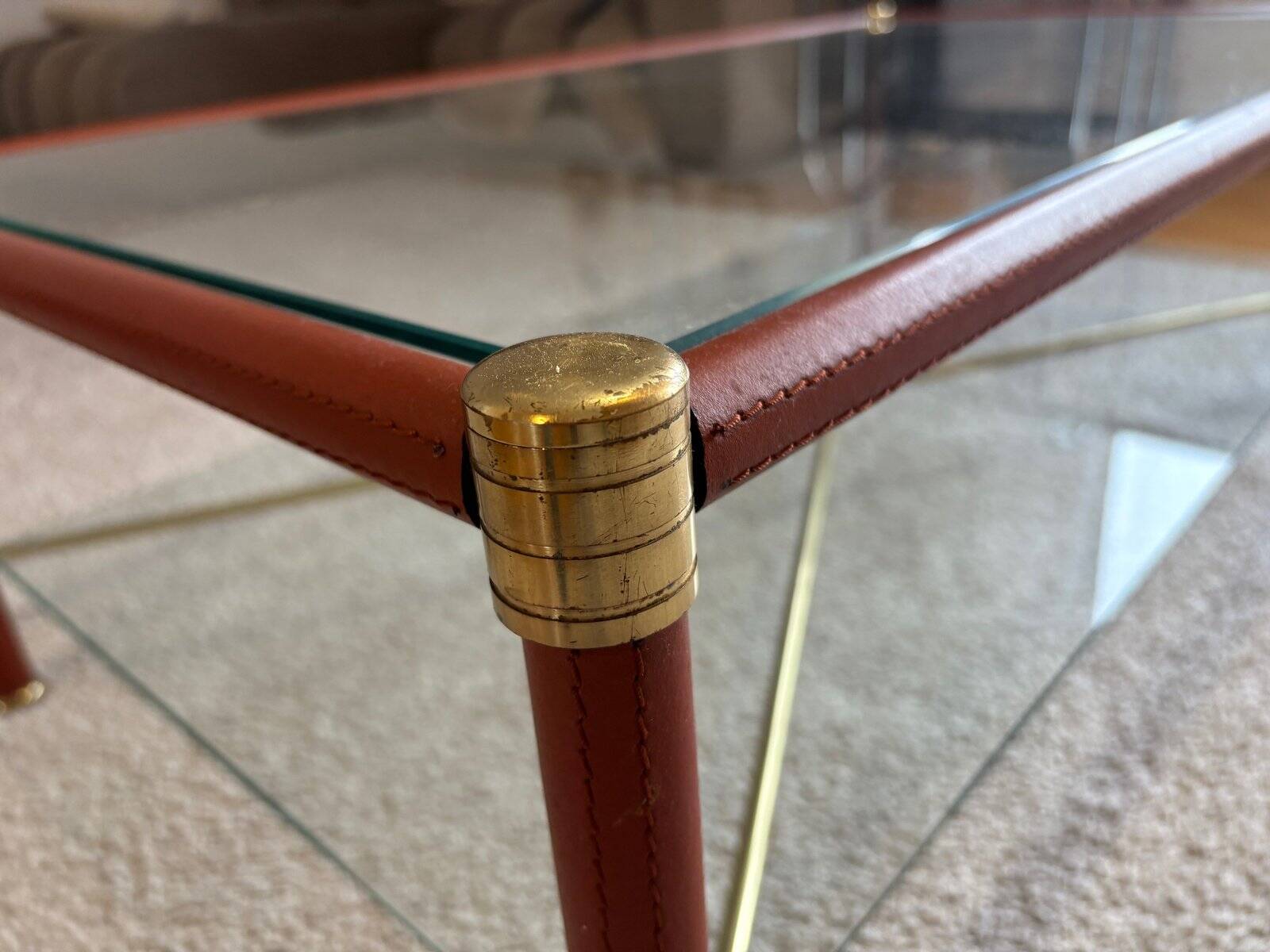 Coffee table in the style of Jacques Adnet, France, 1960s