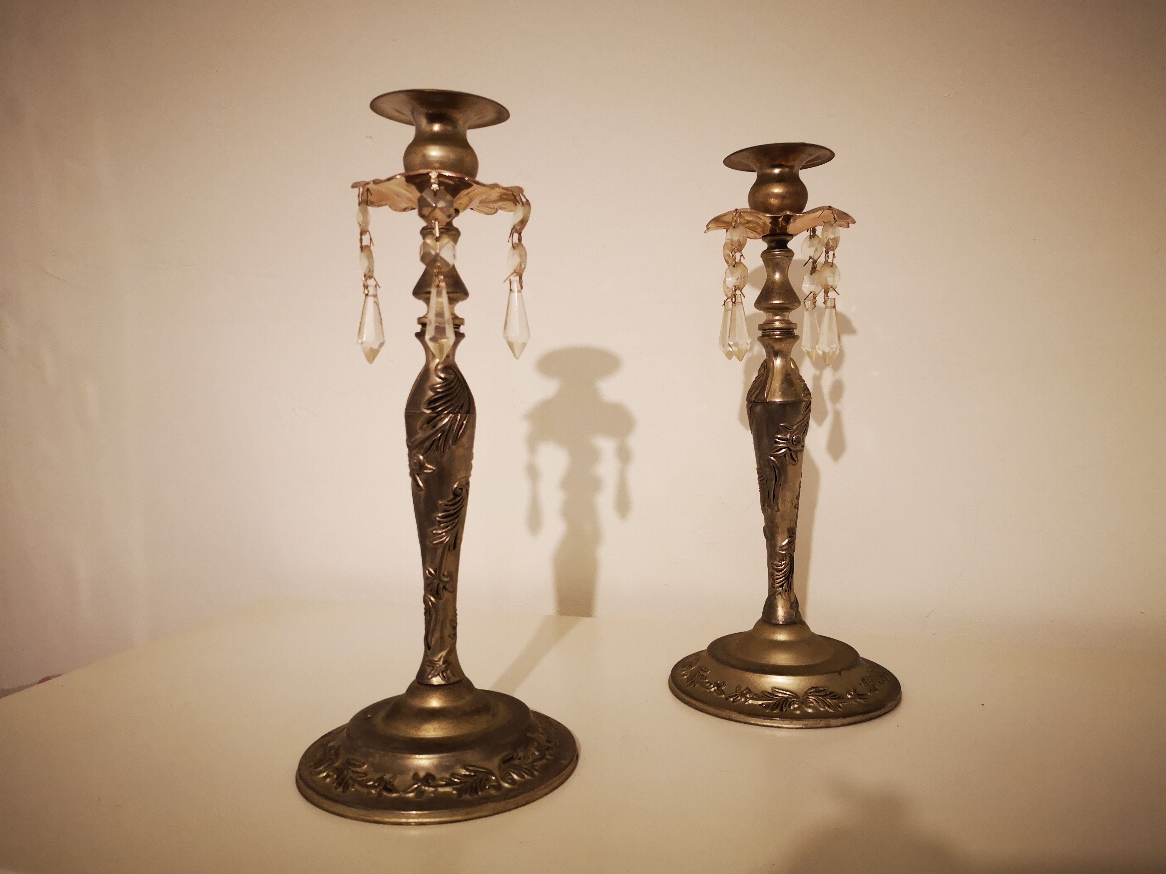 Set of 2 metal candlesticks with stamps