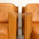 2 fauteuils en chêne et cuir cognac par Skilla