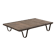 Industrial coffee table made of solid wood and old railway tracks.