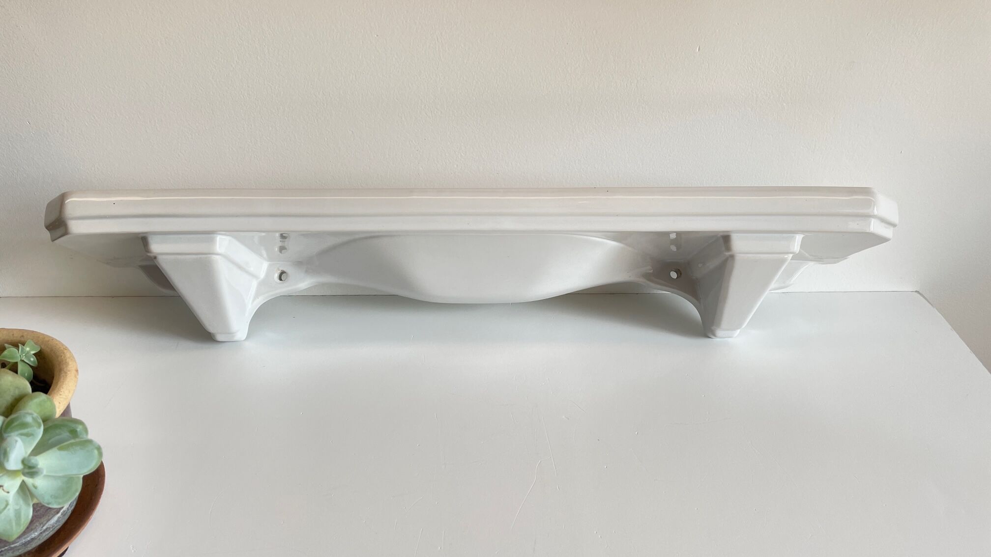 Vintage ceramic wall shelf