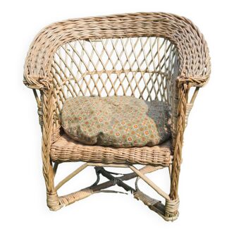 Rattan armchair with cushion