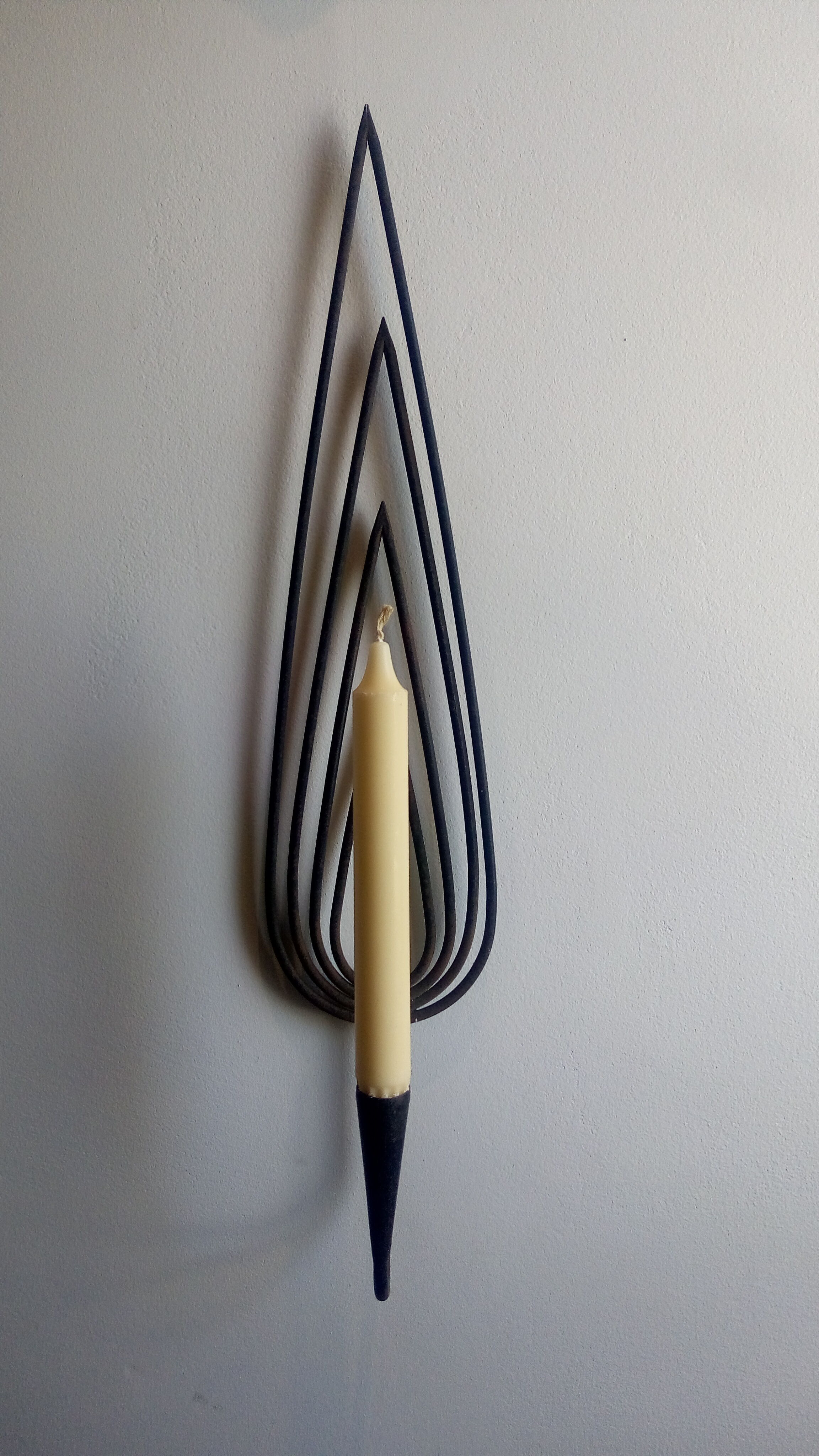 Wrought iron candlestick applied