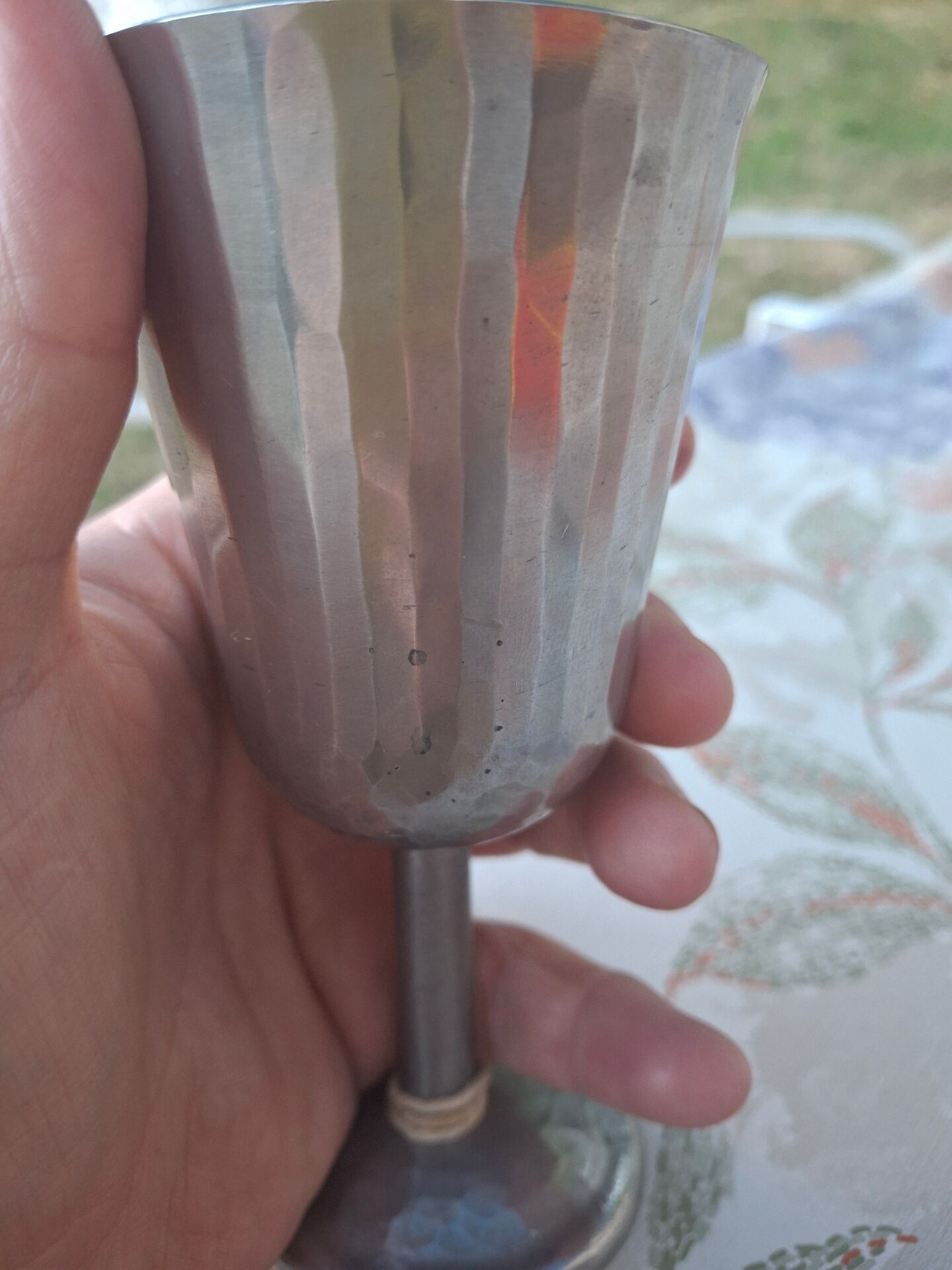 Footed glass in pewter