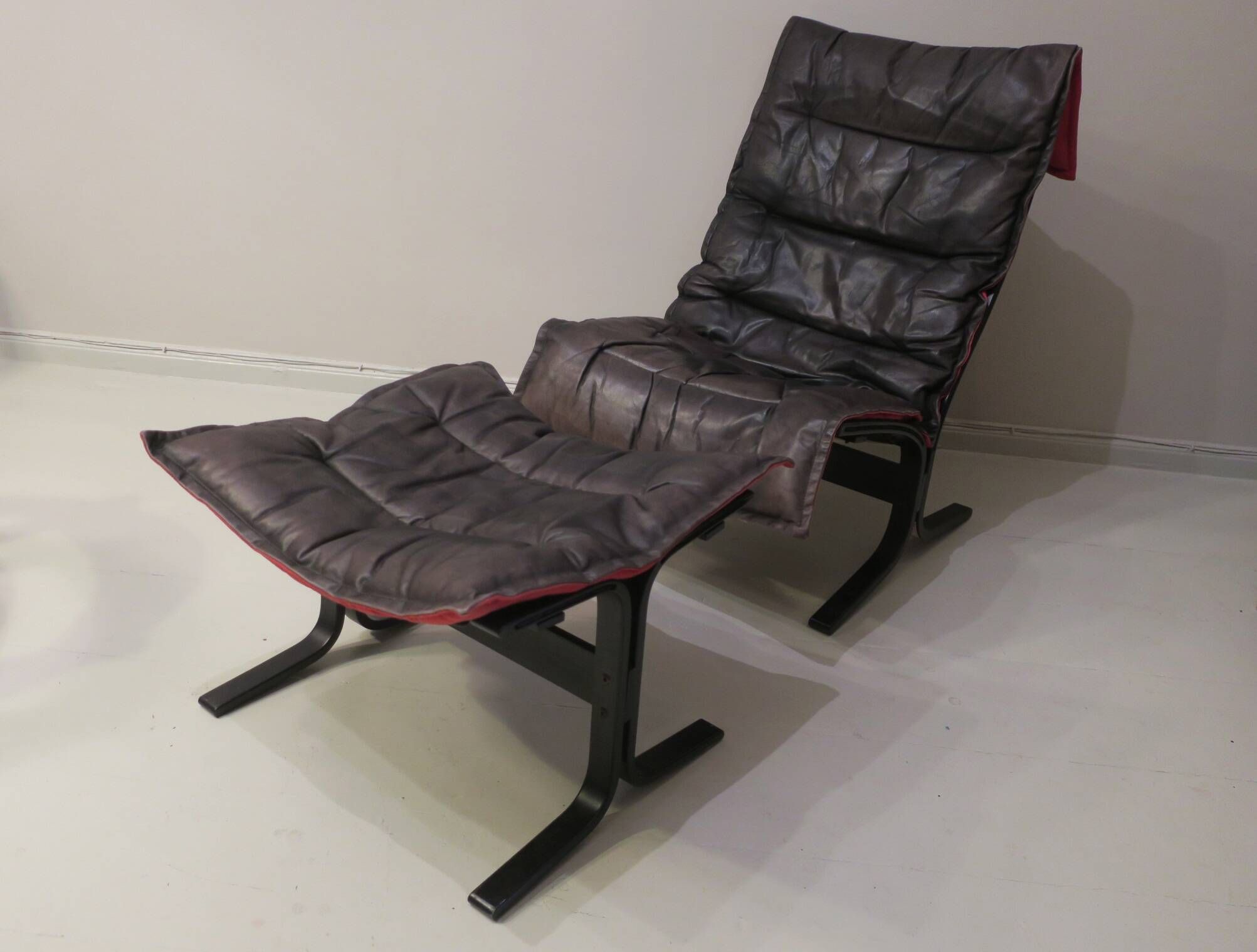 Westnofa patinated leather lounge chair with footrest, Norway 1960s