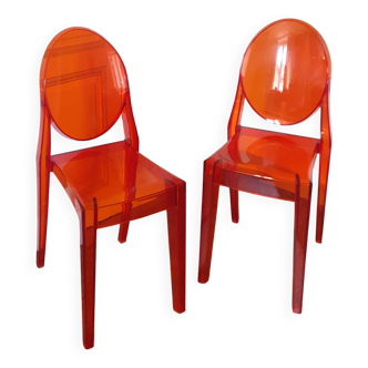 2 Chaises orange Victoria Ghost design Starck éditées par Kartell