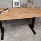Unique wooden table with metal industrial legs.