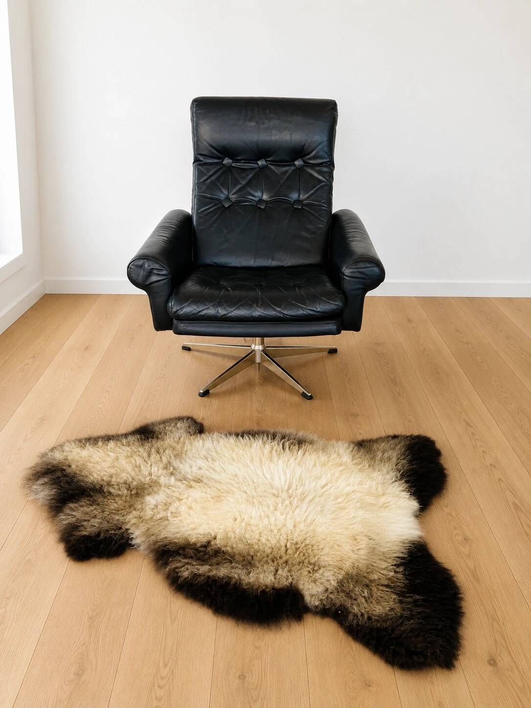 Vintage Danish mid-century black leather swivel chair 1970s