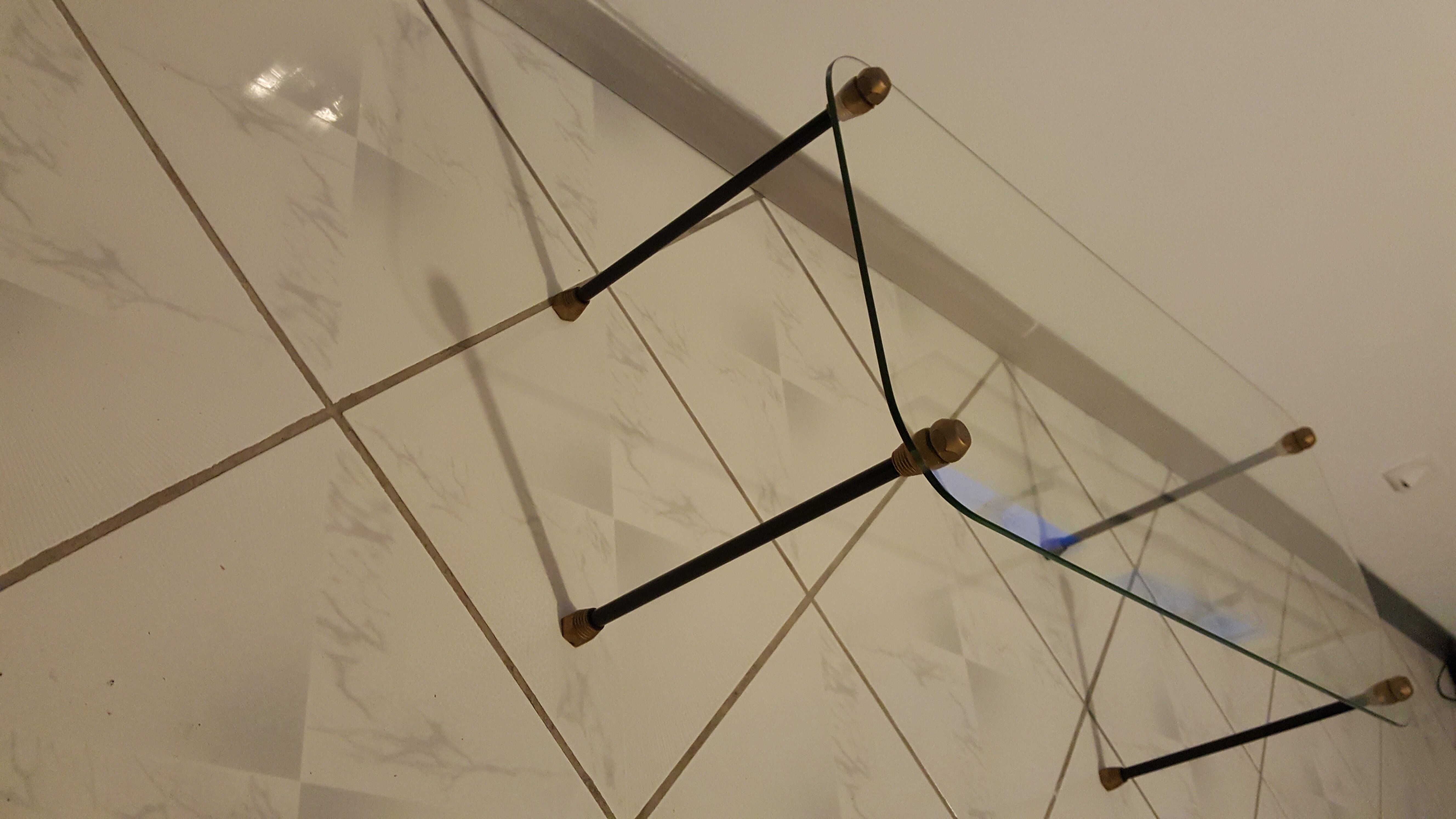 Glass table with brass tip