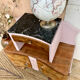 Art Deco bedside table in powder pink painted wood.