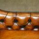 Restored leather Chesterfield sofa in Regency style