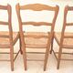8 Straw chairs with high backs in solid wood