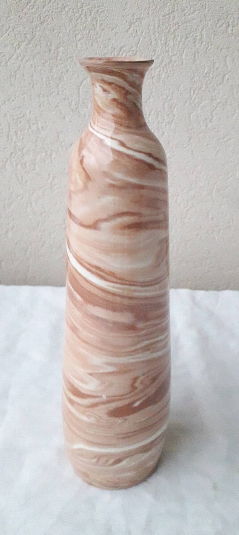 Vase en terres mêlées