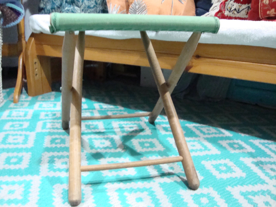 Folding wooden and canvas stool