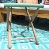 Folding wooden and canvas stool