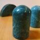Trio of salt shakers, pepper shakers and napkin holders in green marble