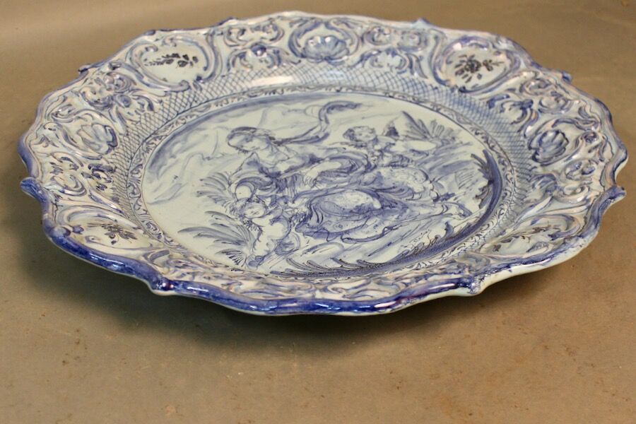 Round hollow dish in blue earthenware diameter 48 cm signed
